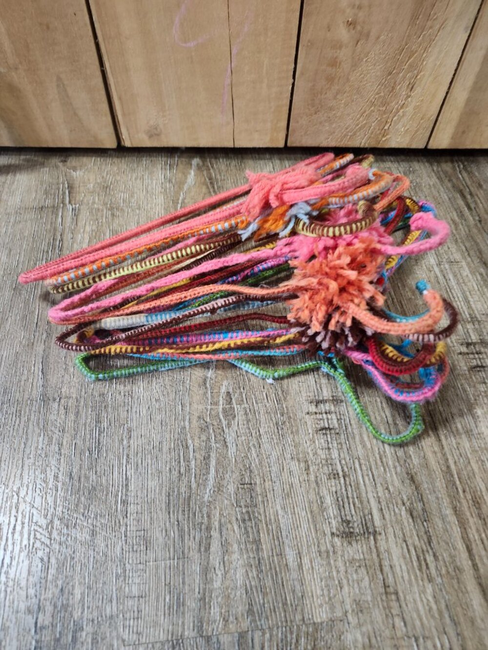 dozen yarn covered metal hangers
